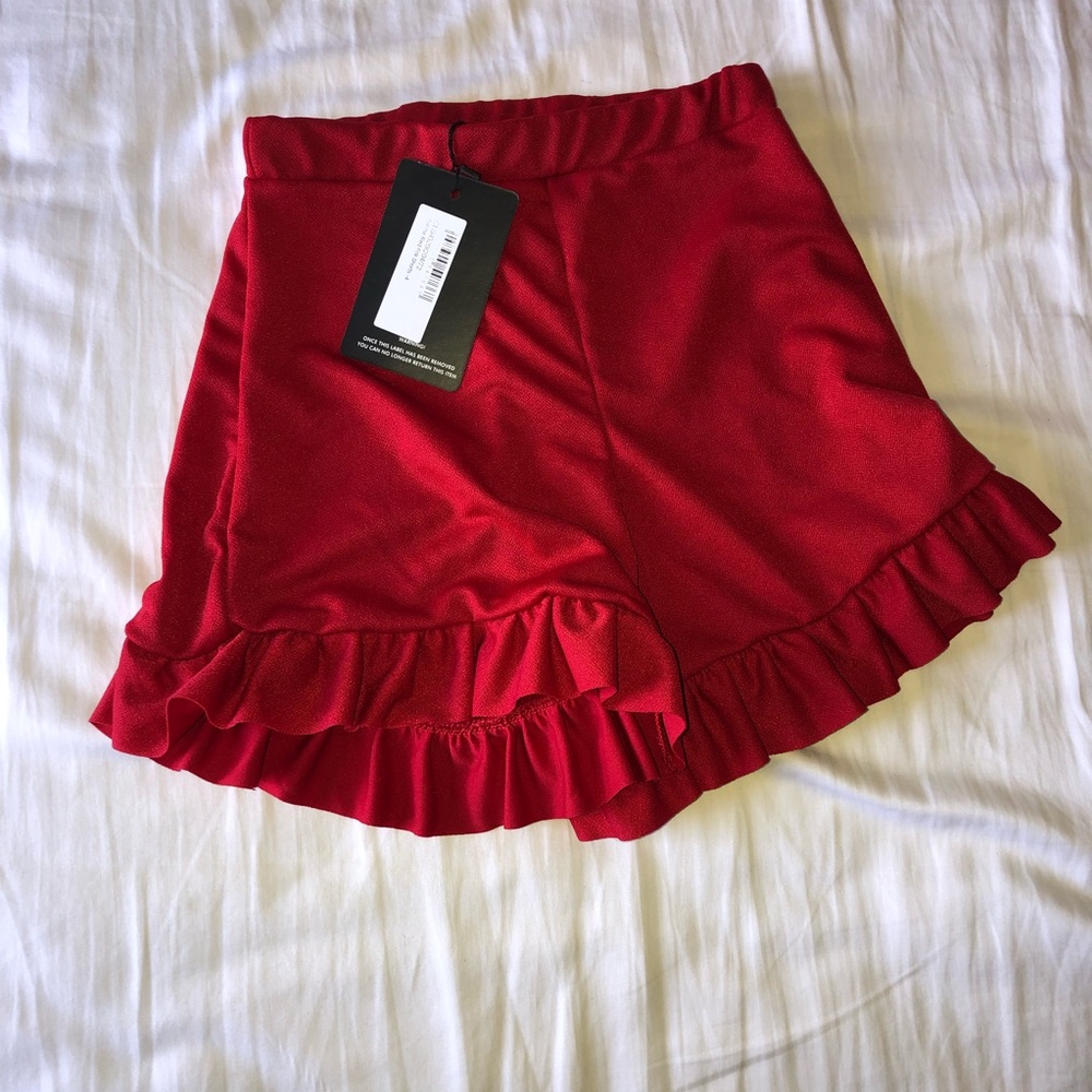 Red shorts, red pants and black and white pants